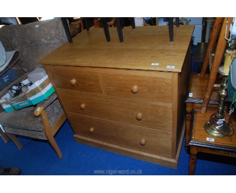 A nicely made light Oak chest of two short over two long drawers, 1000 mm wide x 685 mm deep x 910 mm high, approx.