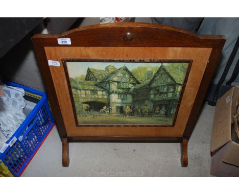 A fire screen of coaching scene, oak framed.