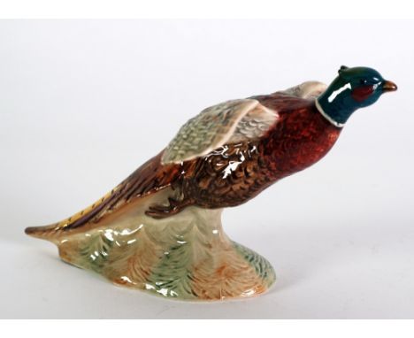 BESWICK POTTERY MODEL OF A PHEASANT TAKING FLIGHT, 6" (15.2cm) high, impressed mark and No. 850 C/R Minor crazing and small/t