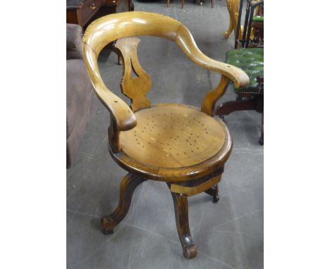 EARLY 20th CENTURY LIGHT OAK REVOLVING OFFICE CHAIR (AS FOUND)