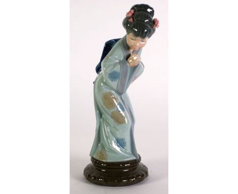 LLADRO PORCELAIN FIGURE OF AN ORIENTAL GIRL, modelled standing with hands clasped together, wearing a floral kimono on a moul
