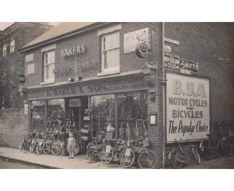 A collection of approximately 138 postcards of social history interest, the majority photographic, including shopfronts, mili