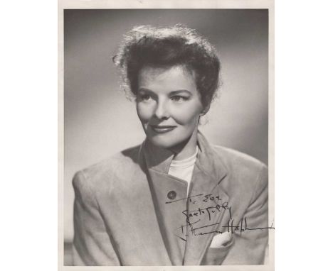 AUTOGRAPHS. A black and white photograph signed by Katharine Hepburn, 25.5cm x 20.5cm, signed and dedicated ‘To Eve, Grateful