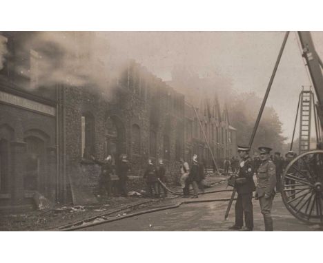 A collection of 22 postcards of disasters, the majority floods and fires, including photographic postcards titled ‘Flood Scen