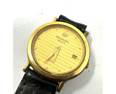 Ladie raymond weil geneve 18ct gold plated wristwatch the watch possibly need replacement battery leather strap worn 