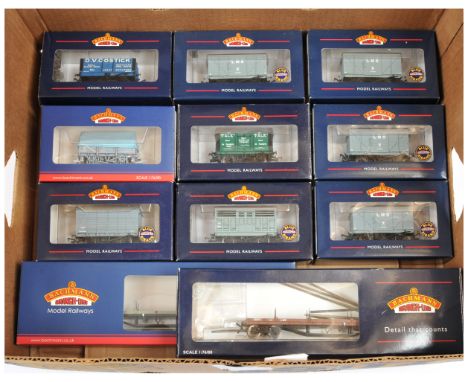 Bachmann OO group of boxed wagons. To include 33-850B Bogie Bolster LMS Brown + home made load; 33-080A 5x Plank China Clay W