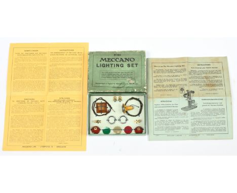 Meccano Lighting Accessory Set. Contents generally Excellent, all strung to backing board and contained in Good/Plus box with