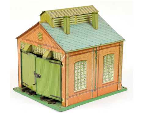 Hornby O Gauge No.1 Engine Shed. Some fading to one side and litho loss to one door, the shed is fitted with electric lightin