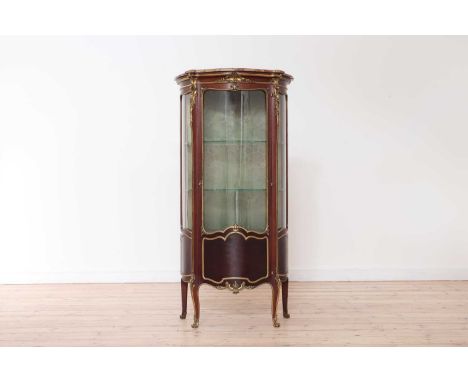 A Louis XV-style mahogany, kingwood and ormolu vitrine,late 19th century, French, in the manner of François Linke, with a brè