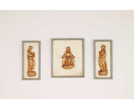 A carved giltwood relief triptych,20th century but incorporating earlier elements, comprising the Madonna flanked by two sain