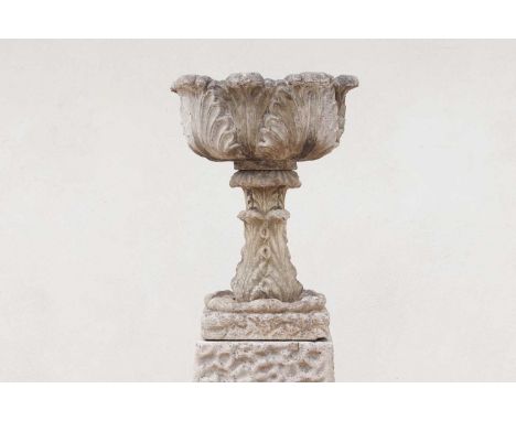 A Victorian composition stone planter attributed to Austin &amp; Seeley, mid-19th century, with acanthus-moulded detail, rais