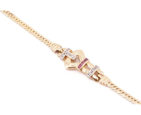 A buckle bracelet set with diamonds and rubies, the buckle motif has been embellished with round table-cut diamonds and highl