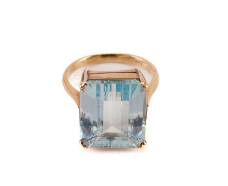 An aquamarine solitaire ring, composed of an octagonal step-cut aquamarine of 15.1 x 13.0 mm, mounted in double claws-setting