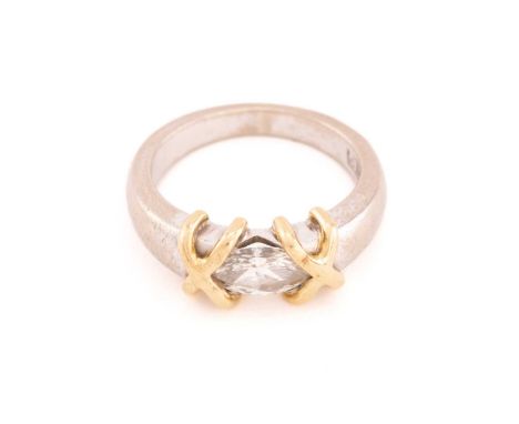 A laterally mounted marquise diamond ring, consisting a marquise-cut diamond of approximately 8.8 x 4.4 x 2.4 mm, mounted sid