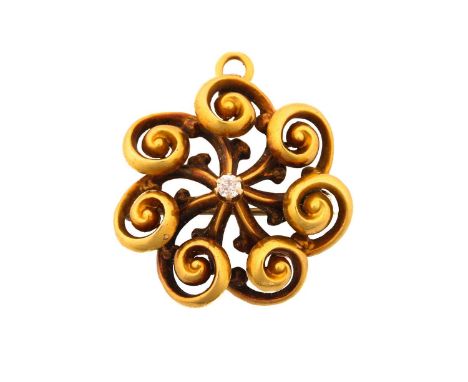A Victorian pinwheel pendant brooch with diamond, in the form of a swirled flowerhead, containing an old-cut diamond claw set