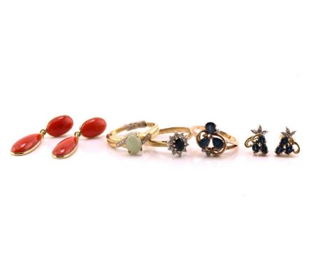 A small collection of gem-set jewellery; including a pair of sapphire and diamond earrings with a matching ring, in floral de