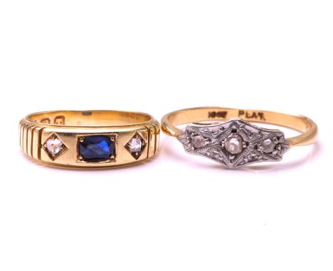 Two gem set rings, the first ring is set with old cut diamonds in a panel style setting on an 18ct yellow gold and platinum m