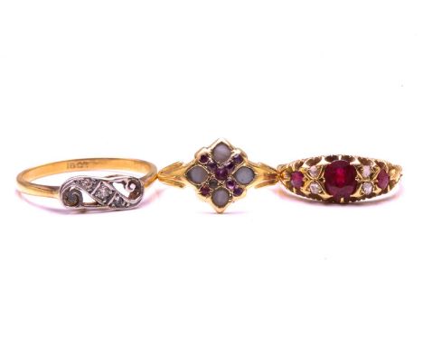 A late Victorian ruby and diamond seven stone half hoop ring, in carved and engraved 18 carat gold mount; together with a Vic