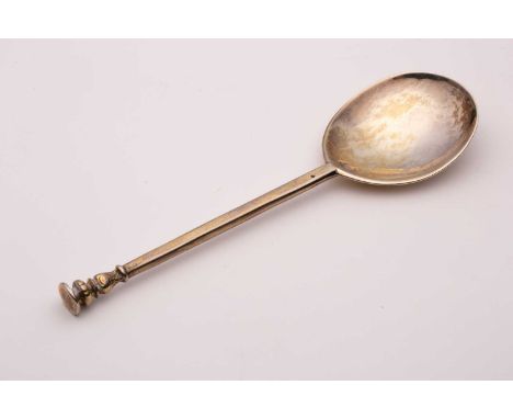 A Charles I silver gilt seal top spoon; with chased and fluted baluster terminal. London, probably 1637, date letter rubbed, 