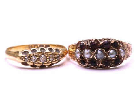 A Victorian 9 carat gold, garnet and split pearl three row half hoop ring, in scalloped and engraved mount and shank; ring si