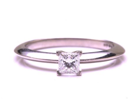 Tiffany &amp; Co. - a princess-cut diamond solitaire ring in platinum, featuring a square princess-cut diamond with dimension