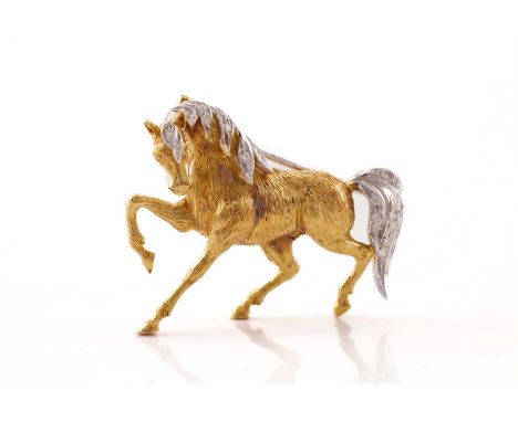 Mappin &amp; Webb - An 18ct gold horse brooch set with diamonds, in the form of a galloping horse, mane embellished with diam