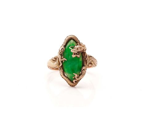 A Chinese dragon ring set with green jade, featuring a jadeite marquise cabochon in patchy chrome green colour, approximately