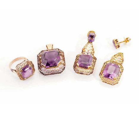 An amethyst demi-parure, including a pair of drop earrings, a ring and a pendant; The pair of earrings each features a large 