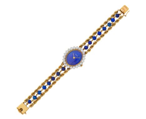 14 kt., mechanical, oval lapis numberless dial, 22 round diamonds ap. 2.20 cts., case dia. ap. 30 x 27 mm., lapis beads ap. 5