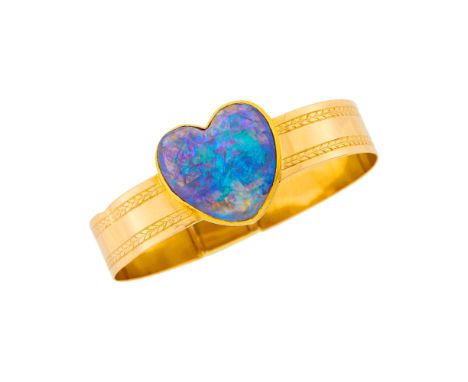 One heart-shaped double cabochon opal ap. 23.4 x 22.4 x 9.8 mm., ap. 16.7 dwts. Inner cir. 6 11/16 inches.Tests as 14 kt.Opal
