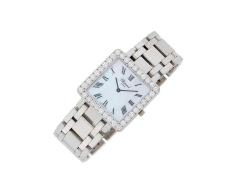 18 kt., quartz, square mother-of-pearl dial, black Roman numerals, 36 round diamonds ap. 2.15 cts., case dia. ap. 28 x 28 mm.