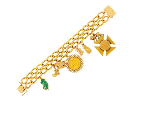 14 kt and 15 ct., seven charms including green enamel New Jersey, pram, house with opening roof, United States gold Indian He