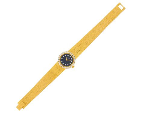 18 kt., quartz, round black dial, round diamond-set markers, 26 round diamonds ap. .90 cts., case dia. ap. 22 mm., signed Pia