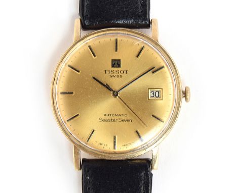 A TISSOT SEASTAR SEVEN 9CT GOLD GENTLEMAN'S WRIST WATCHCirca 1960s, gold dial, batons markers with black inlays and date aper