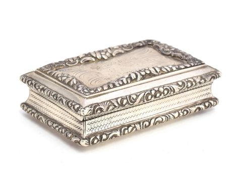 A William IV silver snuff box by Nathaniel Mills, Birmingham 1834, the top and sides chased with floral decoration, 8.8x5.8x2