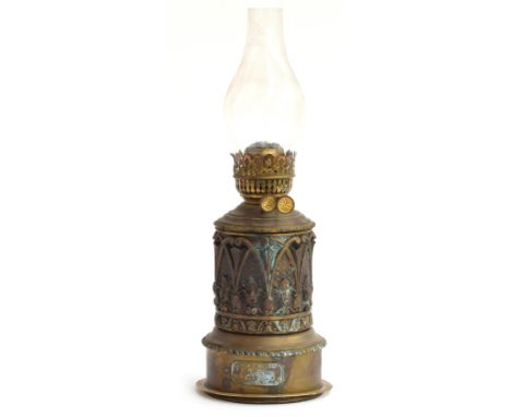 A 19th century French oil lamp, with plaque reading 'Lampe Aureole Brevetee C.Y.', with glass chimney, 42cm high including ch