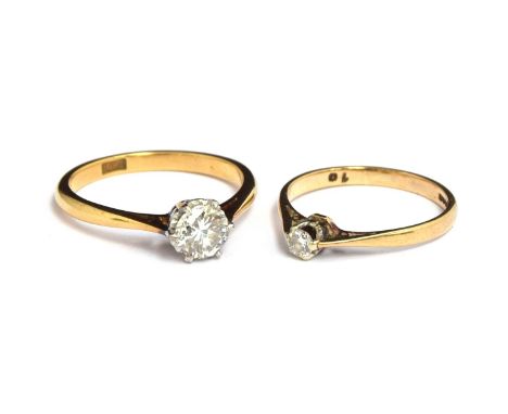 An 18ct gold solitaire diamond ring (approx. 0.5ct, small occlusion visible), size O, gross weight 3.1g, together with a 9ct 