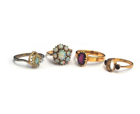 An 18ct gold dress ring set with oval ruby, gross weight 6.8g; together with a 9ct ring with opal cluster, gross weight 4.2g;