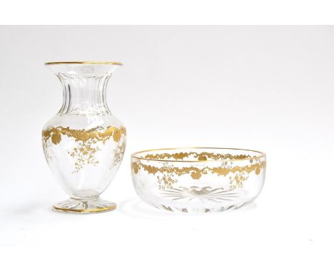 A Saint Louis crystal urn shaped vase, with gilded rim and foliate design, on a star cut base with acid etched mark, 23.5cm h