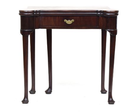 A George III mahogany card table, the shaped fold over top above single frieze drawer, raised on capped club legs and pad fee