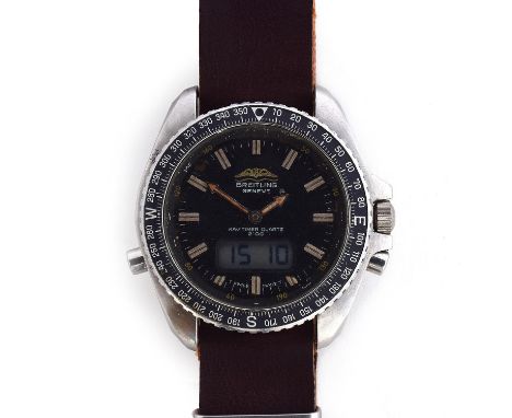 A BREITLING STAINLESS STEEL QUARTZ NAVITIMER WRIST WATCH CIRCA 1970s, raised double baton marker, arrow hands, digital and an