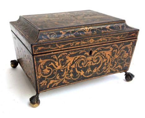 A 19th century penwork sarcophagus tea caddy, the entire surface decorated with floral scrolls and swags, on brass ball and c