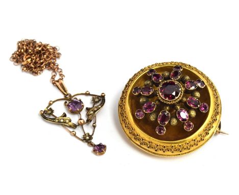 An Art Nouveau amethyst and seed pearl pendant on a 9ct gold chain; together with a yellow metal brooch set with eight round,