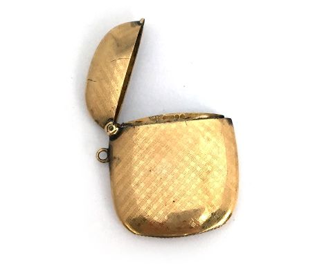 A 9ct gold vesta case, of slender cushion form, with engine-turned decoration, London, C&amp;S Co, 1908, 16.6g
