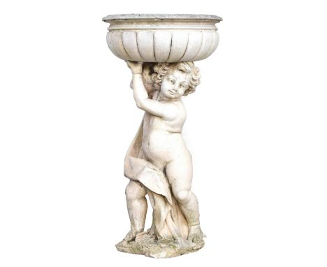 A composite stone urn, supported by a cherub, 118cm high 