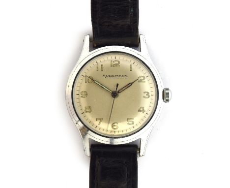 AN AUDEMARS GENTLEMAN'S STEEL MECHANICAL WATCHCirca 1950s, silvered dial with Arabic numerals, syringe handsMovement: 17J man