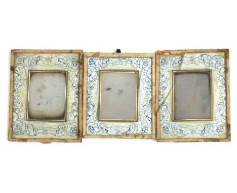 Three unframed 19th century daguerreotype portraits with blue and gold floral borders (af), photographer listed on reverse as