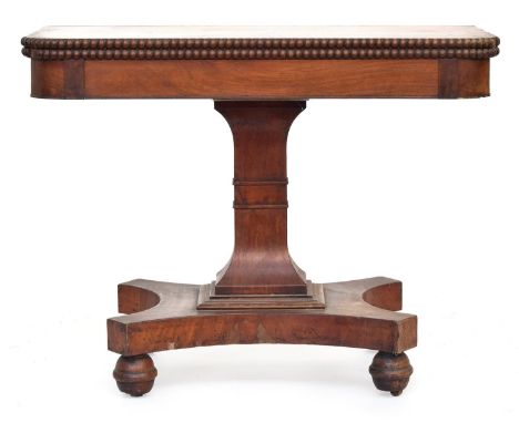 A 19th century mahogany swivel top card table, an applied moulded edge, on pedestal and quatrefoil base, 100cm wide x 50cm de