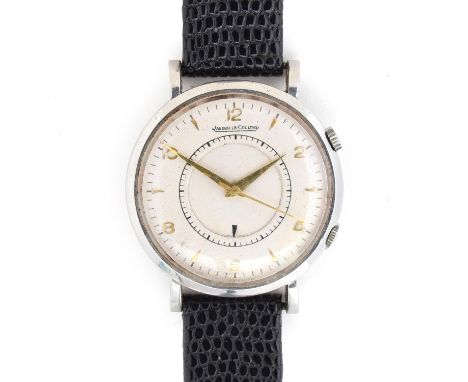 A JAEGER LECOUTRE MEMOVOX STEEL GENTLEMAN'S MECHANICAL WRIST ALARMWhite dial, Arabic numbers on evens, dagger handsMovement: 