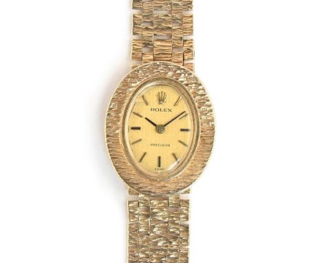 A ROLEX PRECISION LADIES 9CT GOLD BRACELET WATCHDated 1970, ref. 8844, champagne dial with applied baton markers and straight